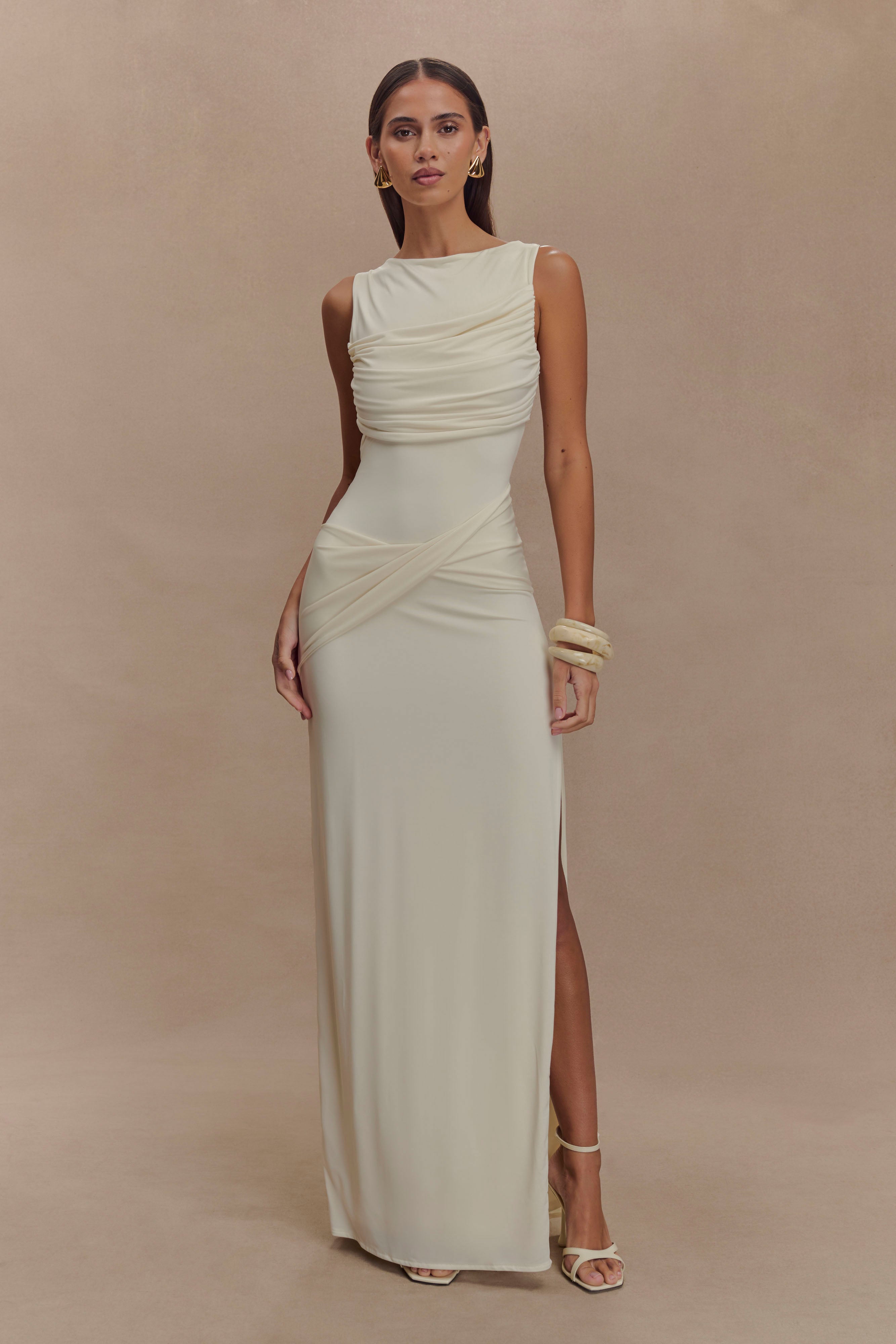 Elegant yellow ruched evening dress with side slit