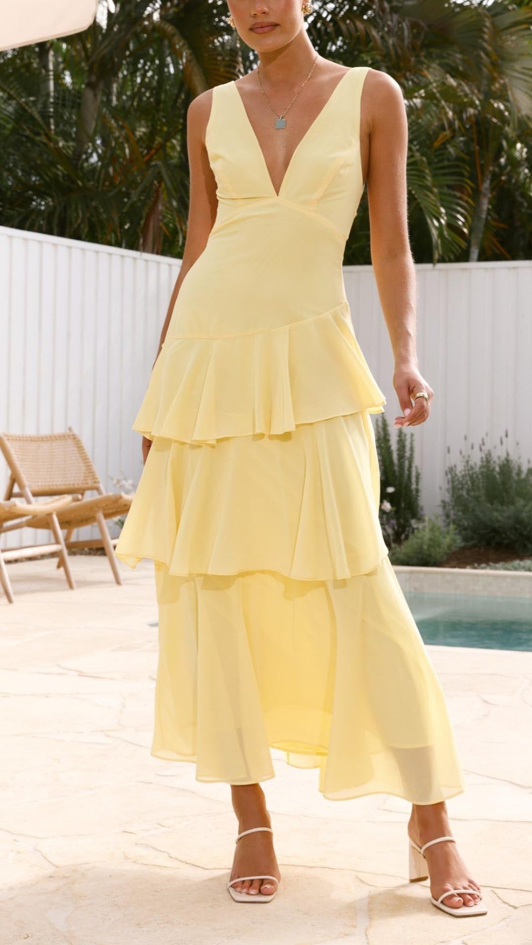 Yellow ruffle maxi dress with V-neck for summer events