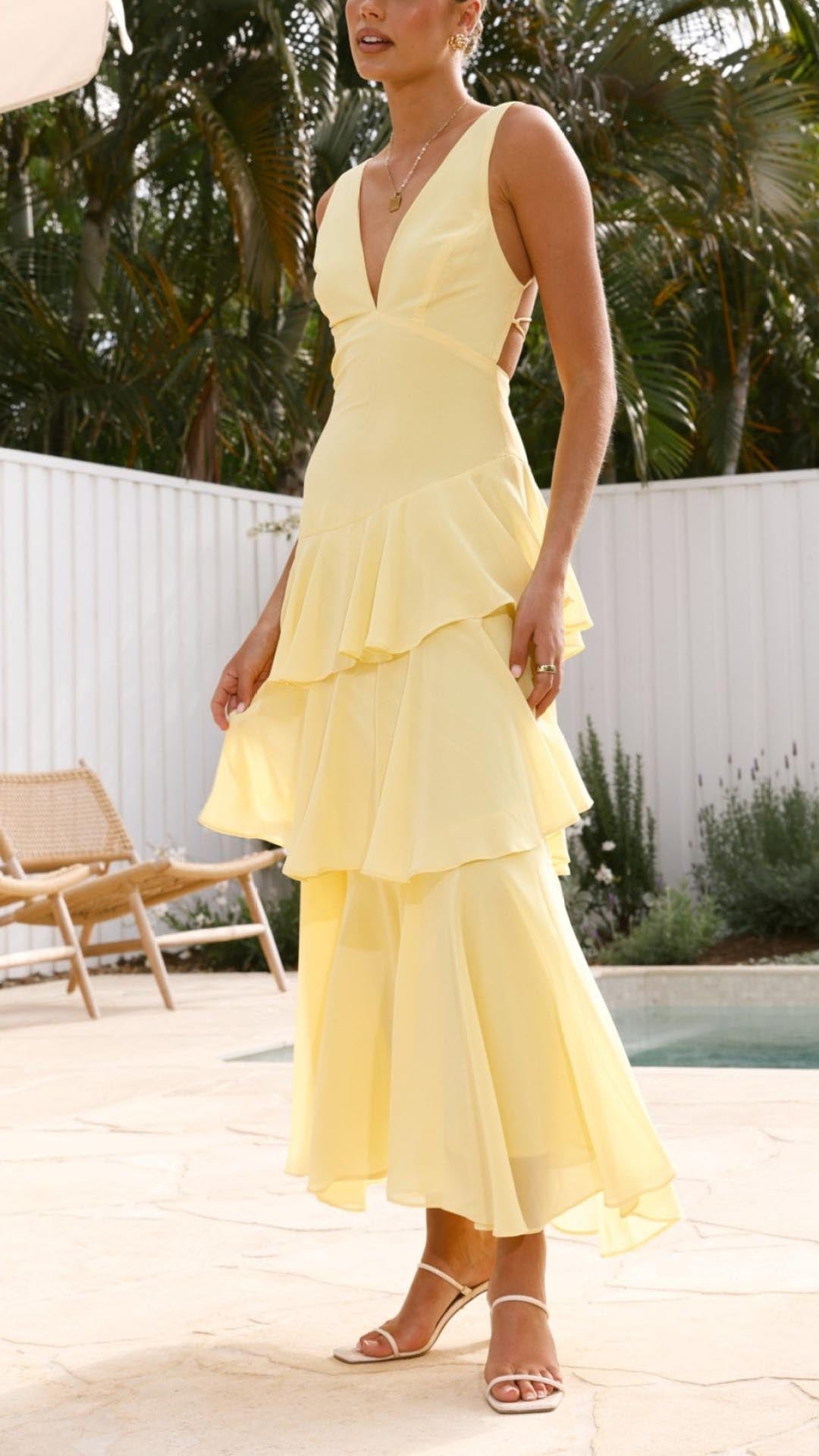 Side view yellow ruffle summer dress garden parties